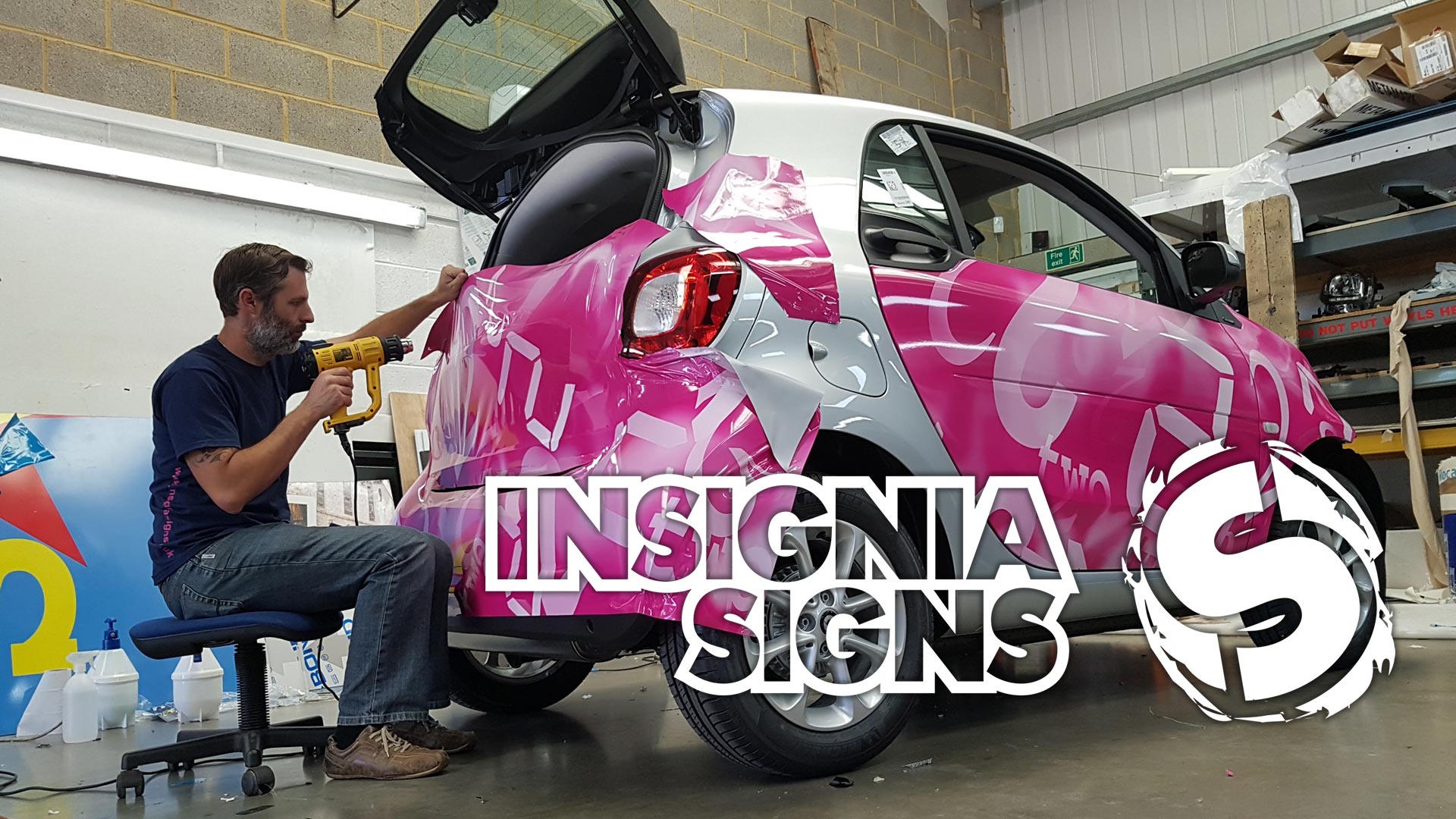 About Insignia Signs - Working on Car