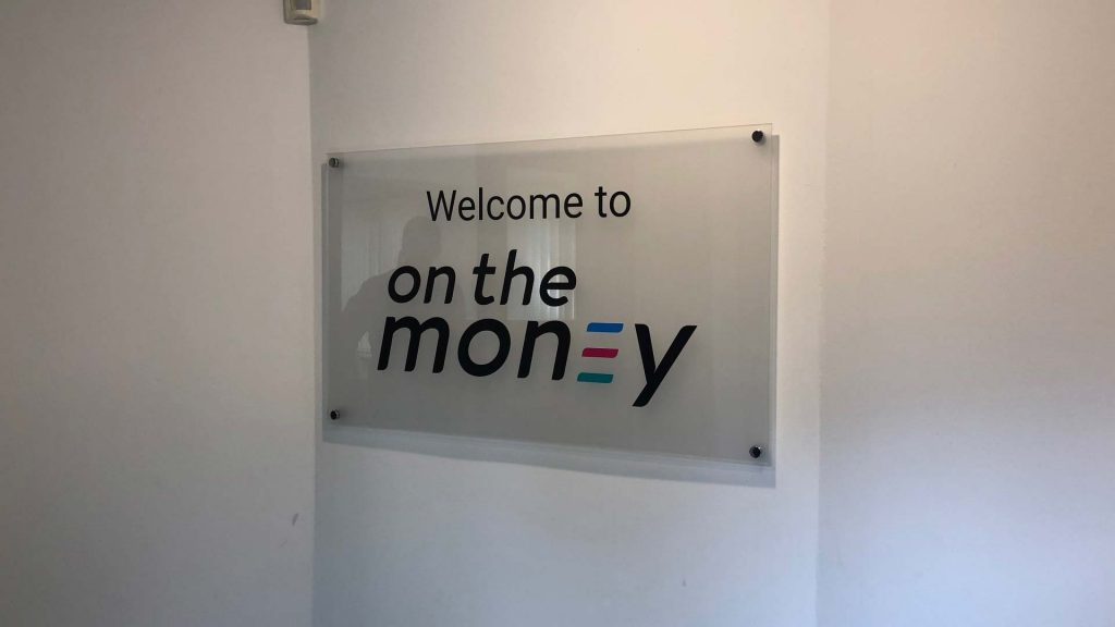 Portfolio - On the Money Wall Sign